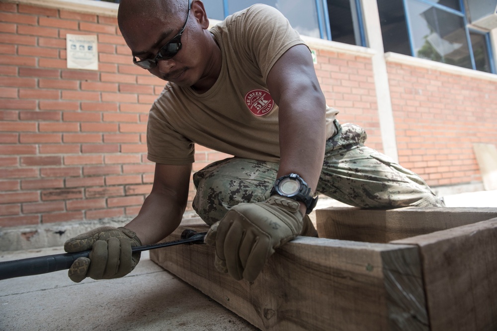 Construction Electrician 2nd Class JanRainer San Juan, Builds a Table for the Continuing Promise 2017 (CP-17) Medical Site in Mayapo, Colombia