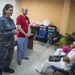 Cmdr. Jennifer Wallinger conducts a basic nutrition class for Colombian medical professionals during CP-17