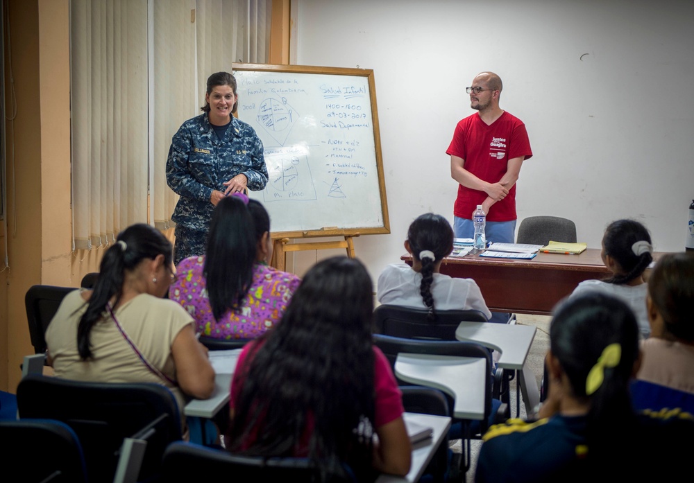 Cmdr. Jennifer Wallinger conducts a basic nutrition class for Colombian medical professionals during CP-17