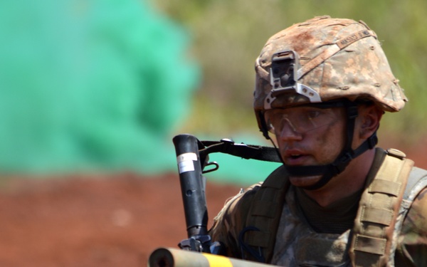 Combat engineers demolish obstacles with Bangalore torpedoes