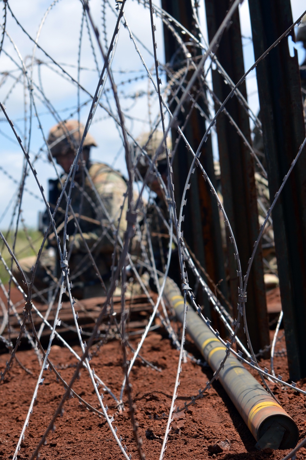 Combat engineers demolish obstacles with Bangalore torpedoes