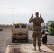 Soldiers load vehicles, HIMARS for transport