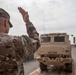 Soldiers load vehicles, HIMARS for transport