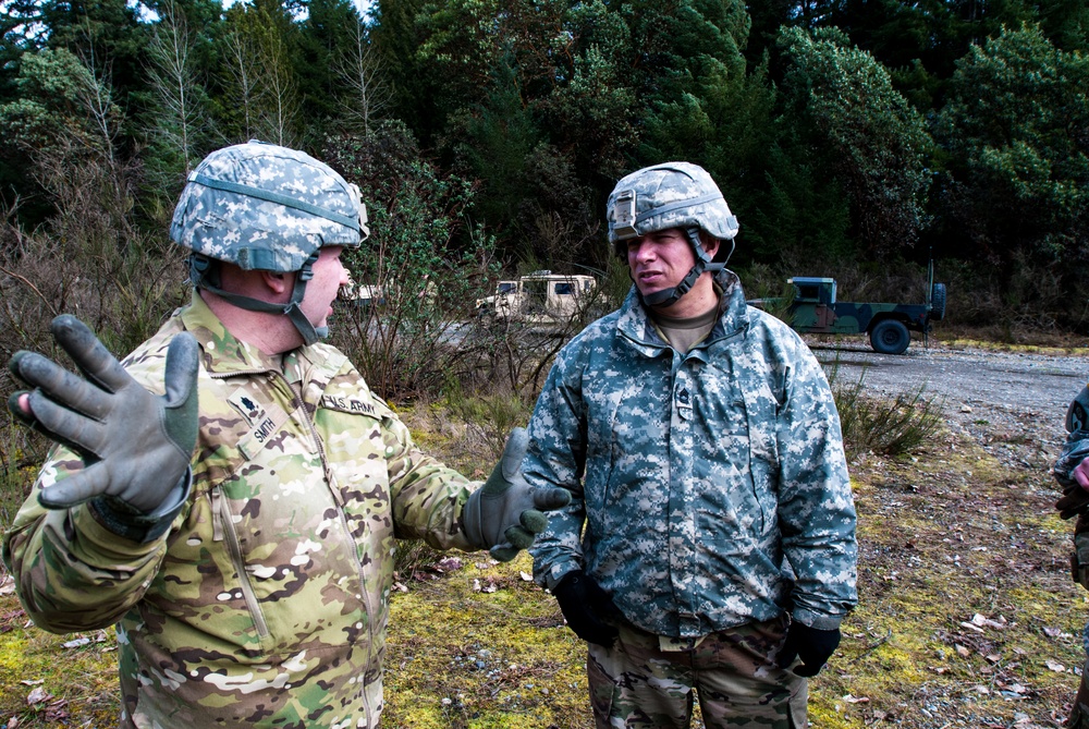 Lt. Col. Ryan T. Smith provides direction on the ground to soldiers in the 301st Maneuver Enhancement Brigade
