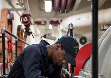 Line shaft bearing oil check aboard USS Bonhomme Richard