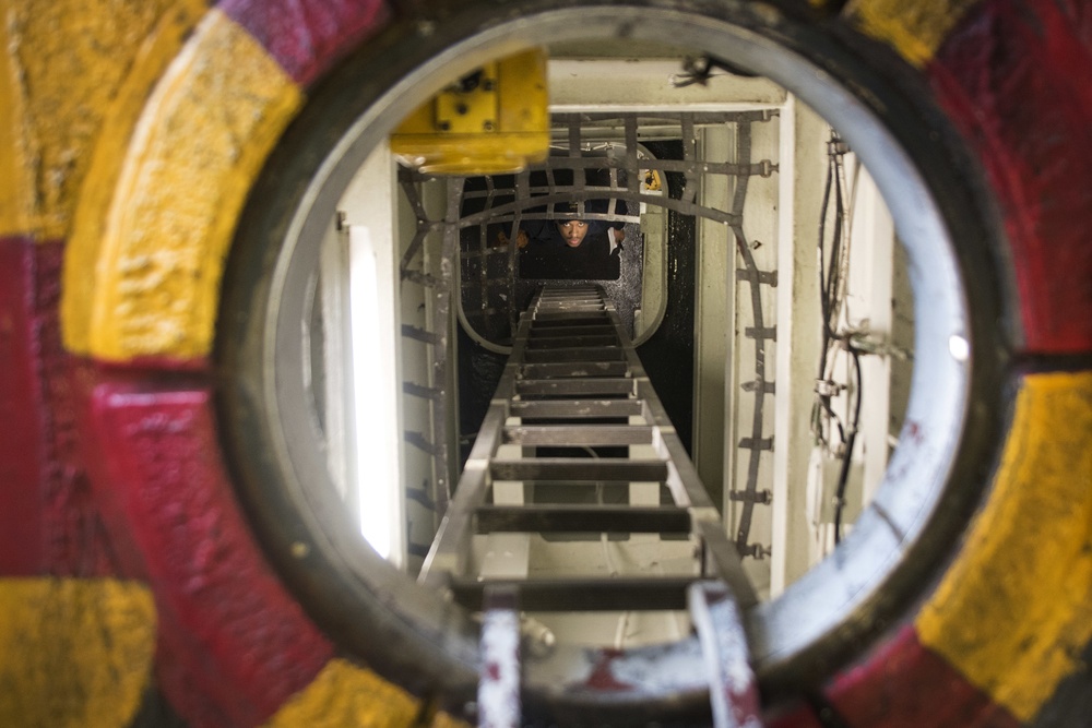 Line shaft bearing oil check aboard USS Bonhomme Richard