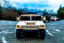 Soldiers from the 301st Maneuver Enhancement Brigade prepare to depart for a convoy on Joint Base Lewis-McChord, Washington