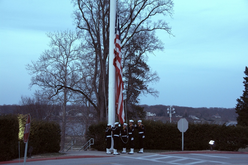 Naval Health Clinic Annapolis ceremoniously lowers the ensign for the last time at its Hospital Point