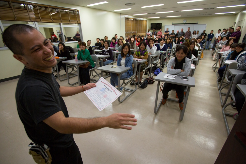 English program students, volunteers awarded aboard Camp Schwab