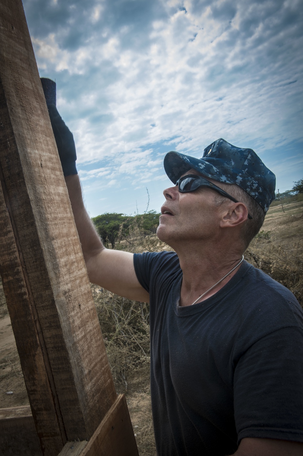Lt. Cmdr. Don Rogers Sands a Beam of a Kitchen During Continuing Promise 2017 (CP-17)