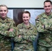 Geospatial engineers pose for a photograph at the 301st Maneuver Enhancement Brigade headquarters