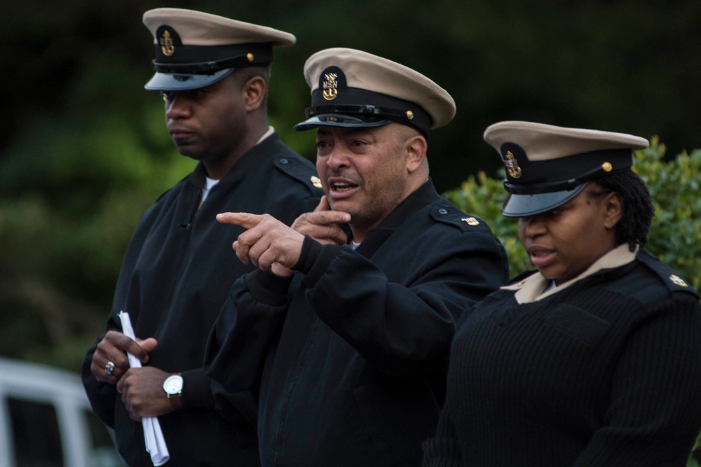 Chief petty officers from U.S. 7th Fleet and USS Blue Ridge (LCC 19) honor fallen chiefs on the day of the 124th birthday of the chief petty officers rank