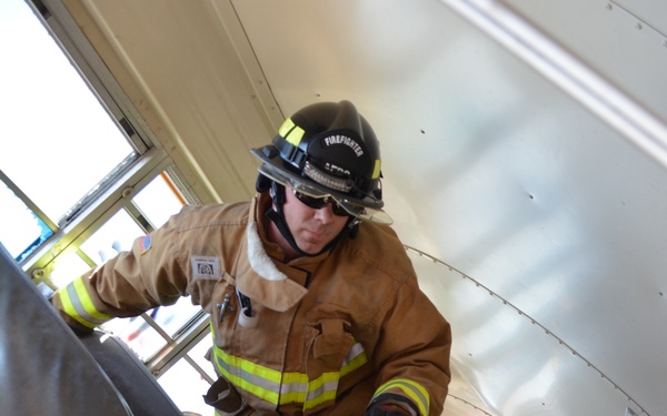 507th Civil Engineer Squadron participate in a heavy vehicle extrication exercise