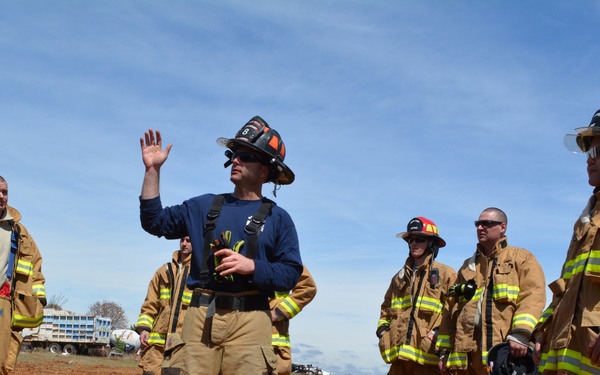507th Civil Engineer Squadron participate in a heavy vehicle extrication exercise