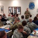 Maj. Gen. Tim Orr visits with Iowa Air and Army Guard members in Fort Dodge.