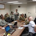 Maj. Gen. Tim Orr visits with Iowa Air and Army Guard members in Fort Dodge.