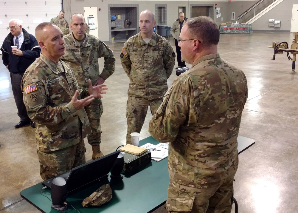 Maj. Gen. Tim Orr visits with Iowa Air and Army Guard members in Fort Dodge.