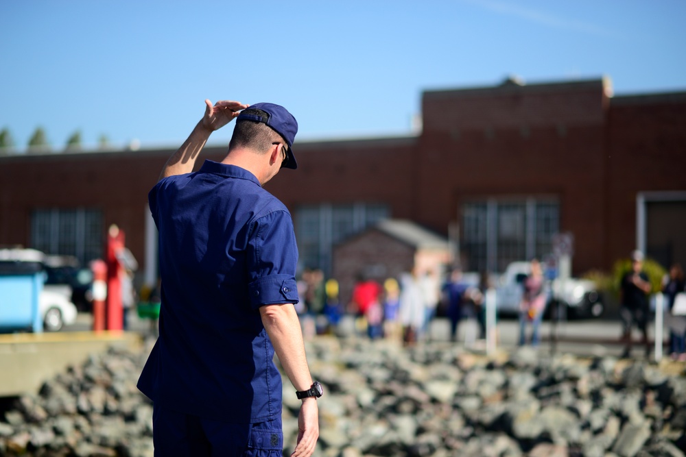 Captain Moore calls family members over to greet their loved ones