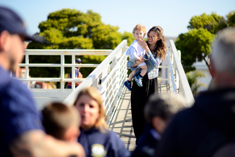 A mother and son board the Stratton to greet their loved one