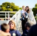 A mother and son board the Stratton to greet their loved one