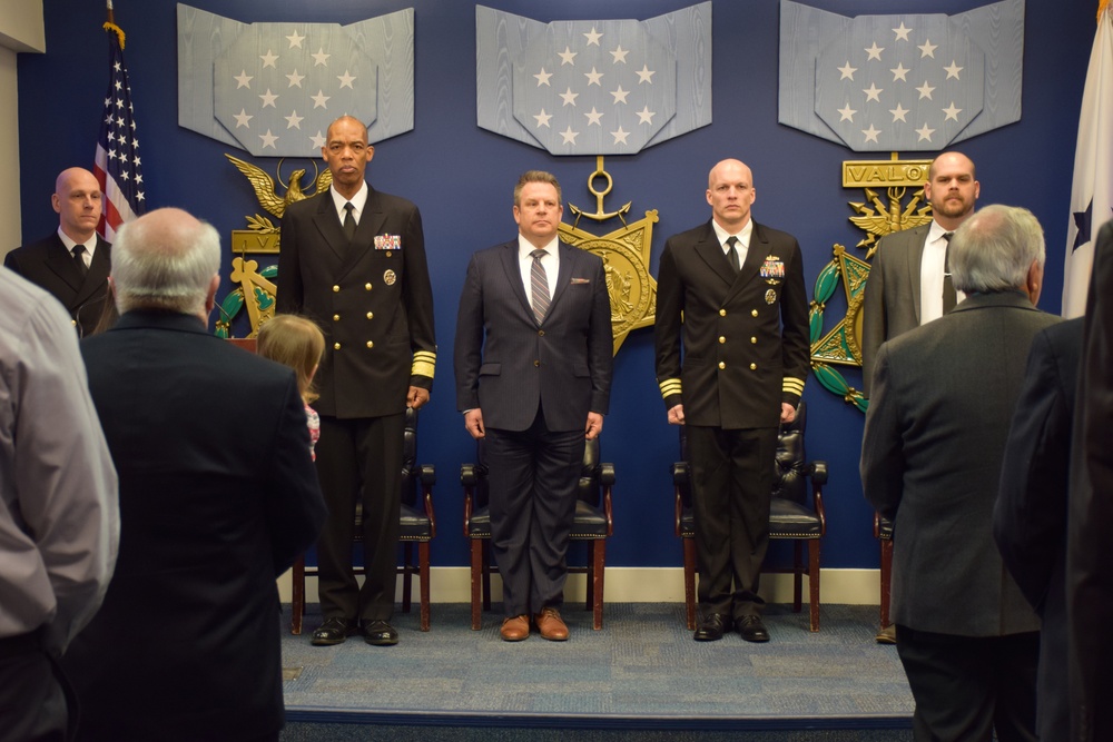 Cmdr. Michael Adams retires