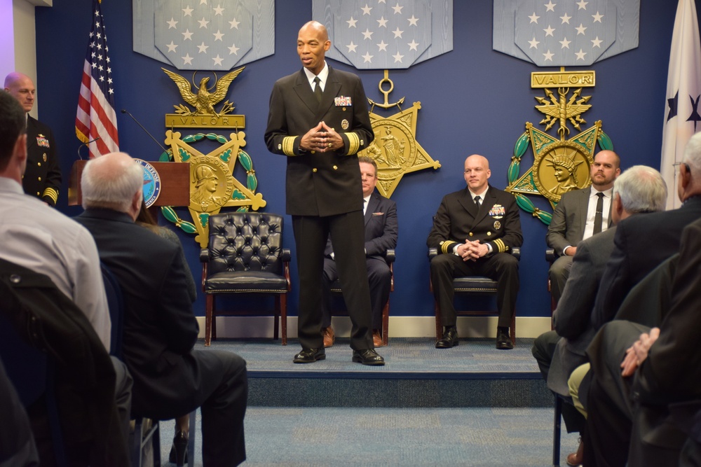 Cmdr. Michael Adams retires