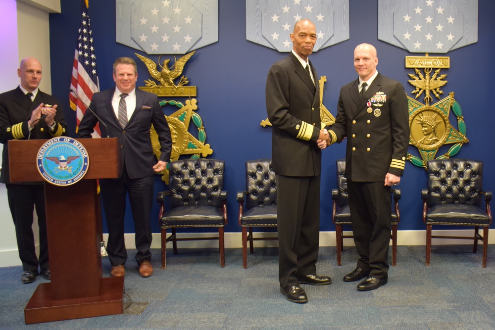 Cmdr. Michael Adams retires