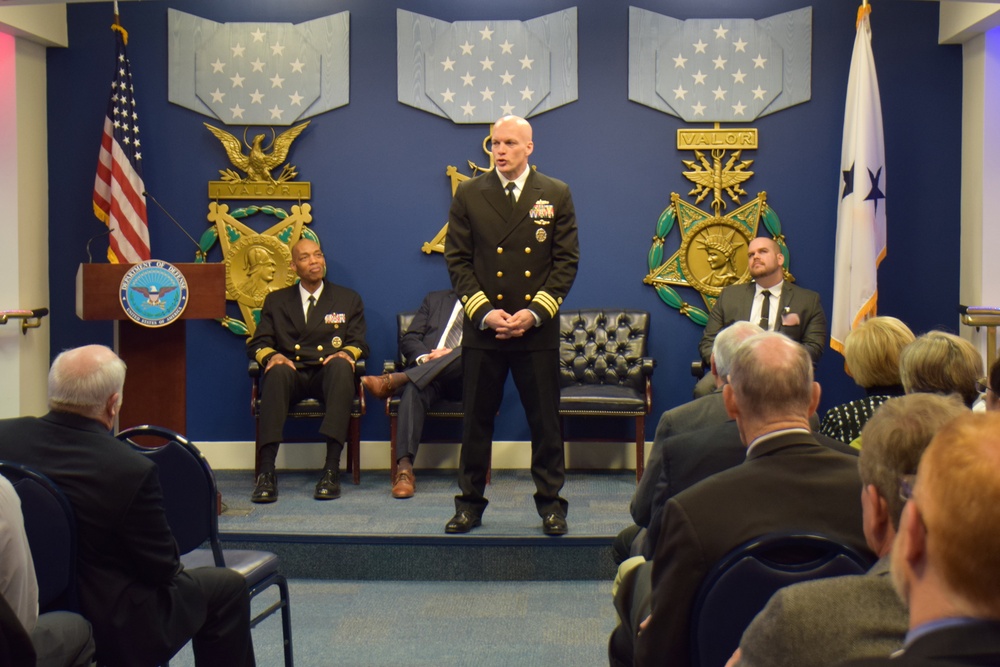 Cmdr. Michael Adams retires