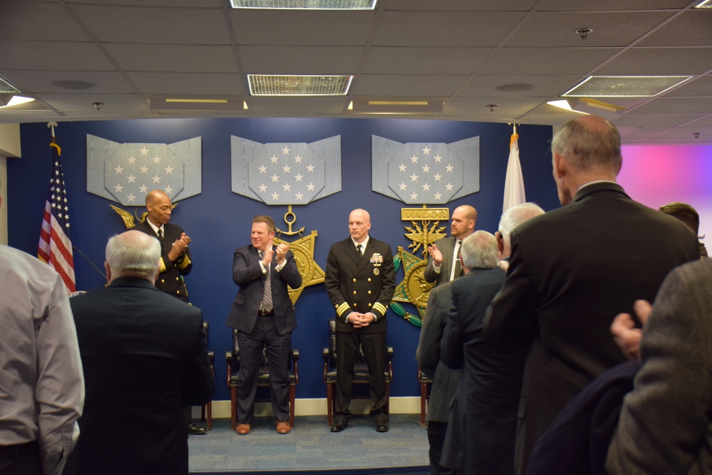 Cmdr. Michael Adams retires