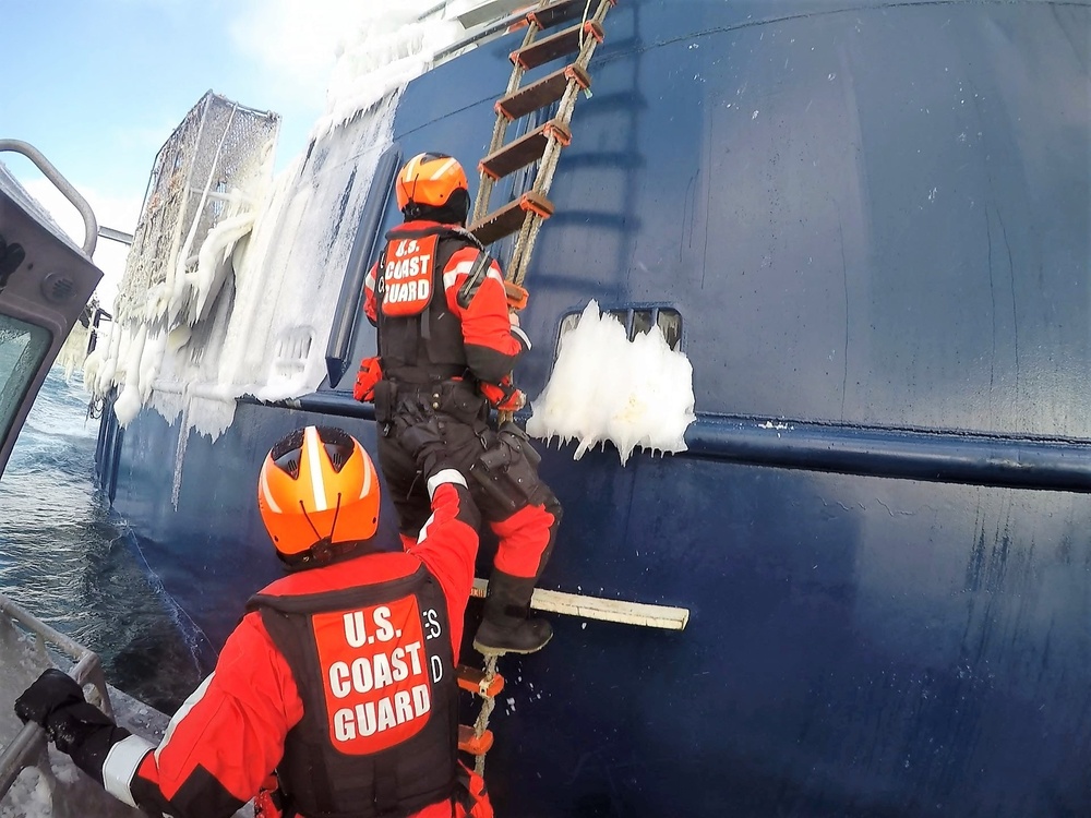 Coast Guard Cutter Bertholf crew boards fishing vessel in Bering Sea