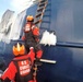 Coast Guard Cutter Bertholf crew boards fishing vessel in Bering Sea