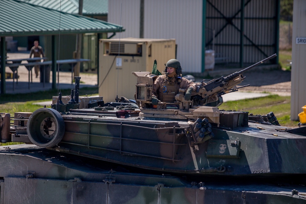 The big guns: Maj. Gen. Love fires tanks with 2nd Tank Bn.