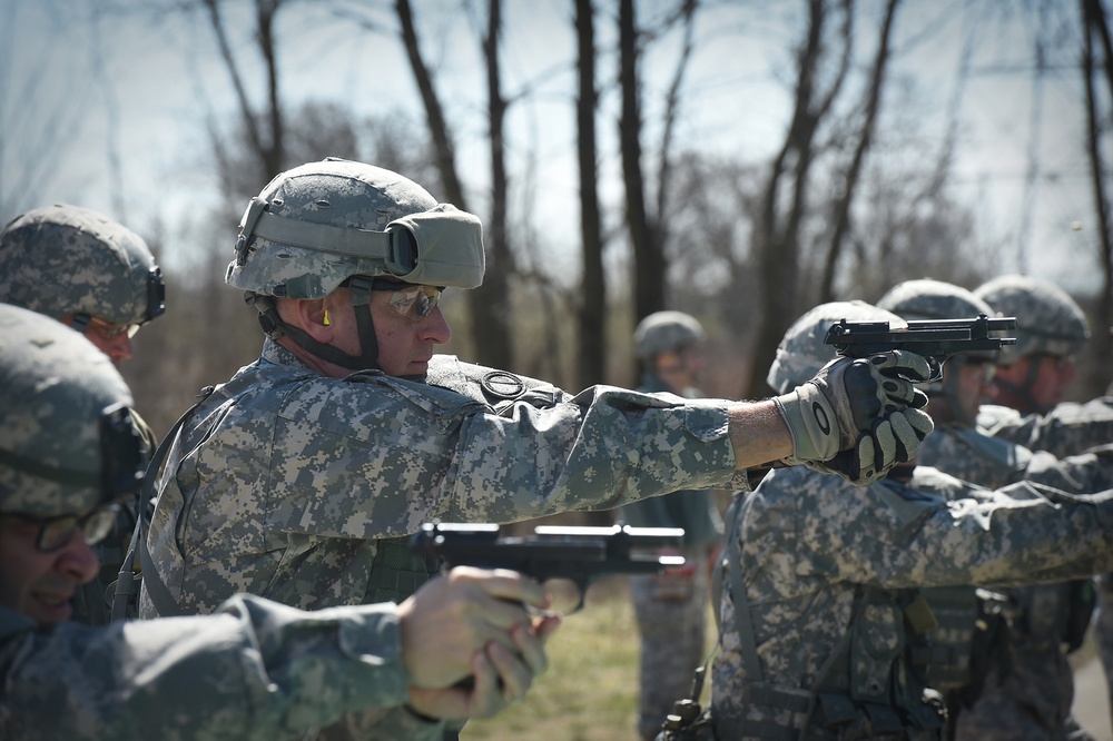 Headquarters staff conducts weapons qualification during BA