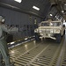 Airman directs Humvee