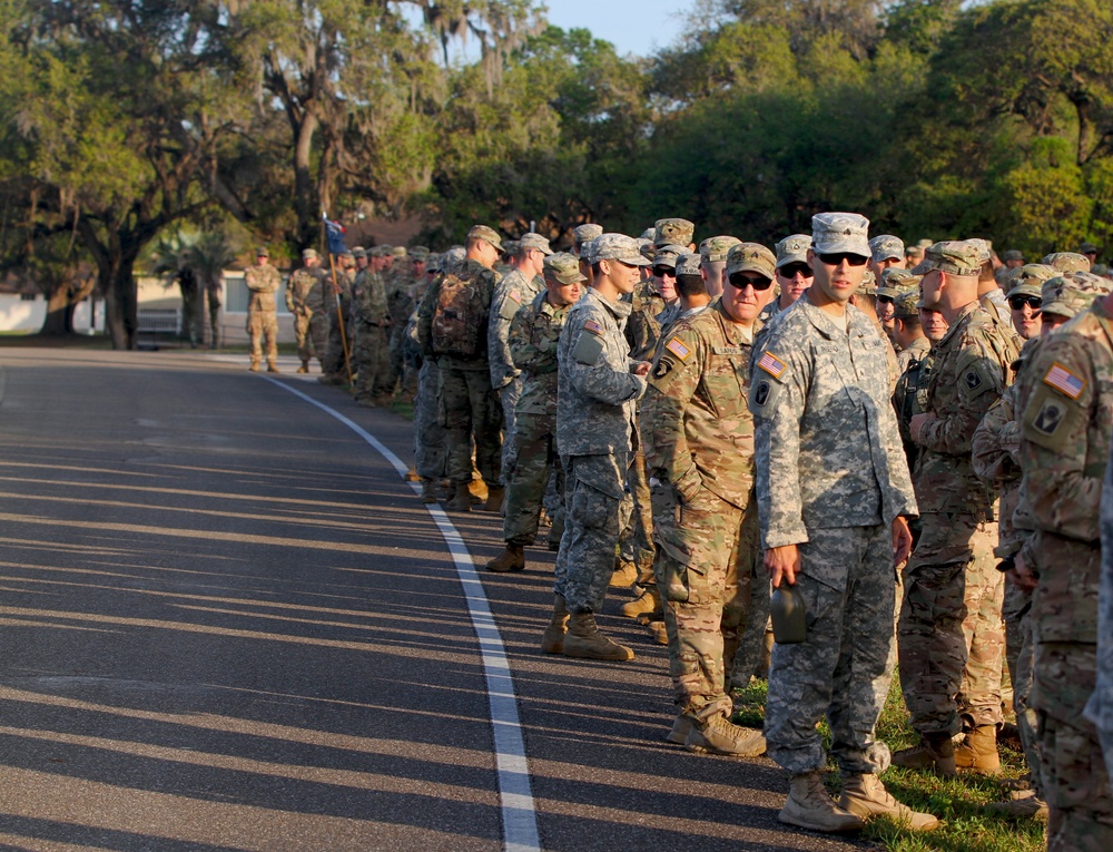 National Guard Soldiers await participants of the Expert Infantryman Badge ruck march