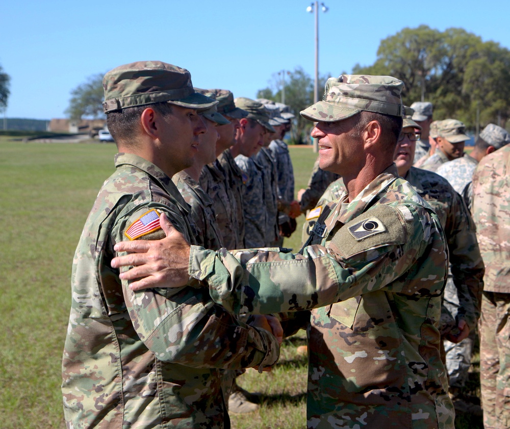 National Guard Soldiers congratulated after graduating from the Expert Infantryman Badge qualification