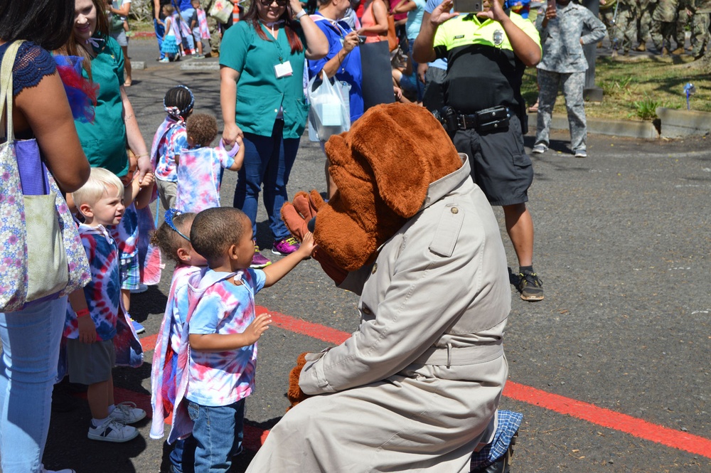 Army celebrates children with pinwheels, parade