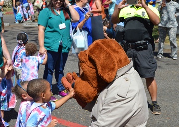 Army celebrates children with pinwheels, parade
