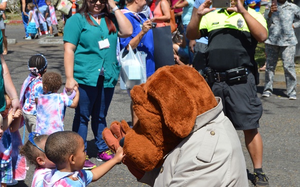 Army celebrates children with pinwheels, parade