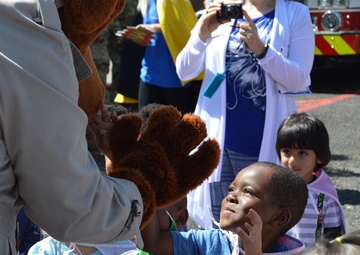 Army celebrates children with pinwheels, parade