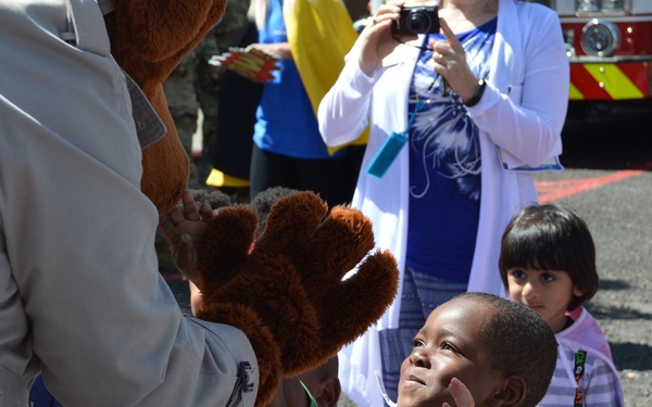 Army celebrates children with pinwheels, parade
