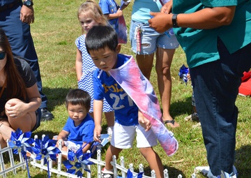 Army celebrates children with pinwheels, parade