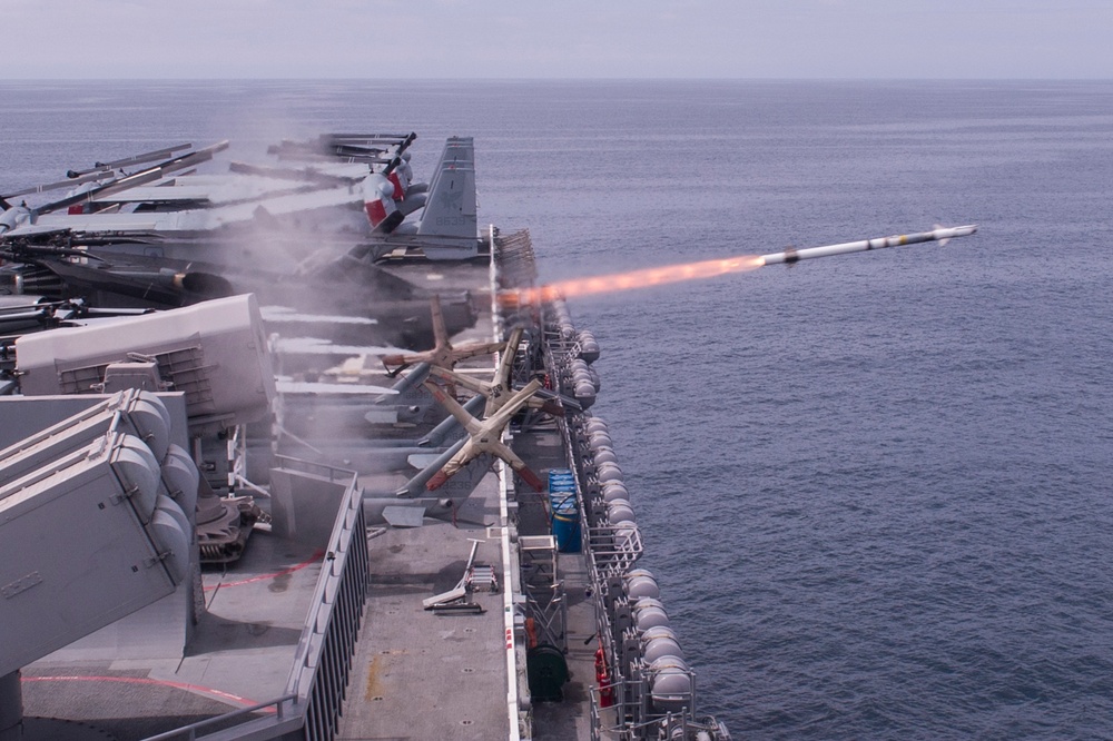 A rolling airframe missile (RAM), a surface-to-air intercept missile, launches from amphibious assault ship USS America (LHA 6)
