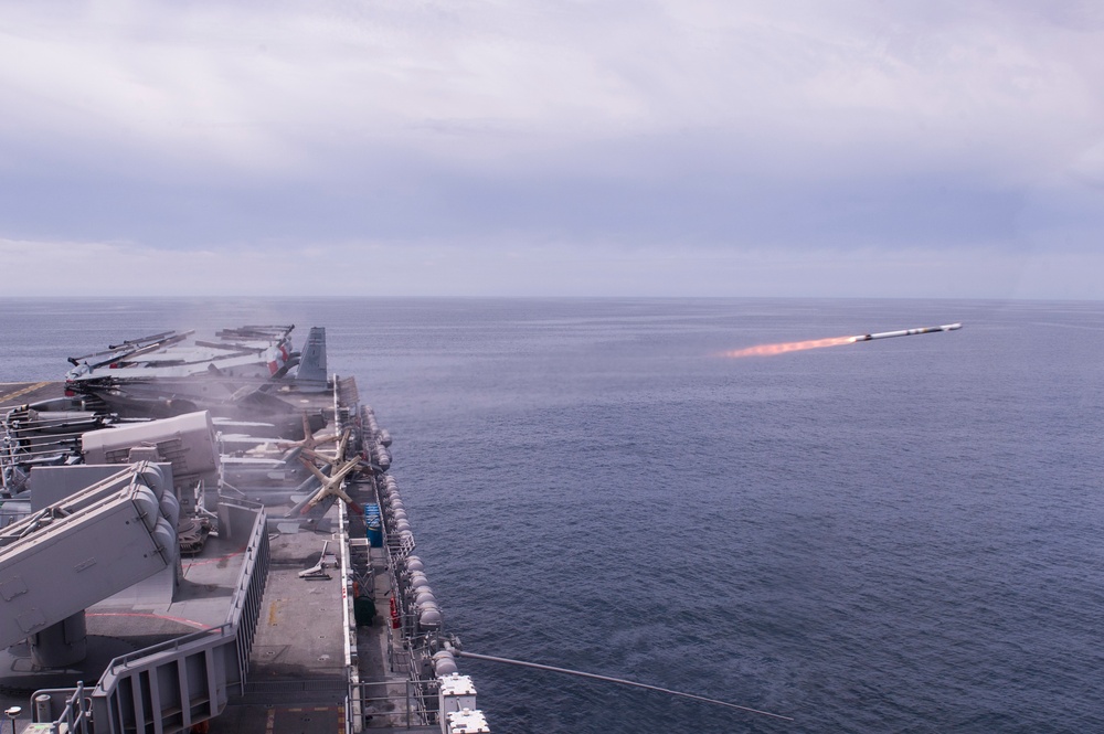 A rolling airframe missile (RAM), a surface-to-air intercept missile, launches from amphibious assault ship USS America (LHA 6)