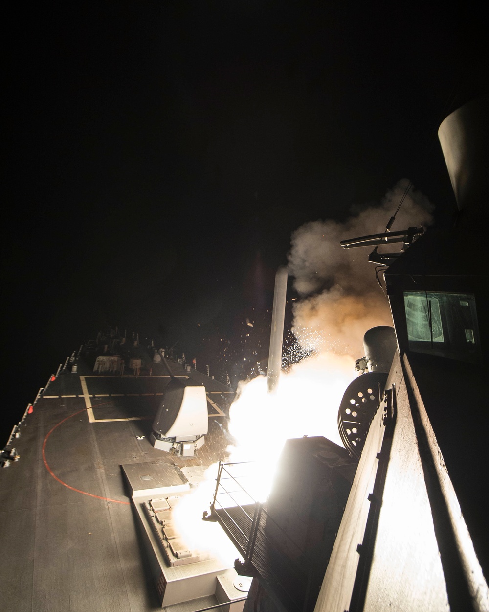 USS Ross (DDG 71) fires a tomahawk land attack missile