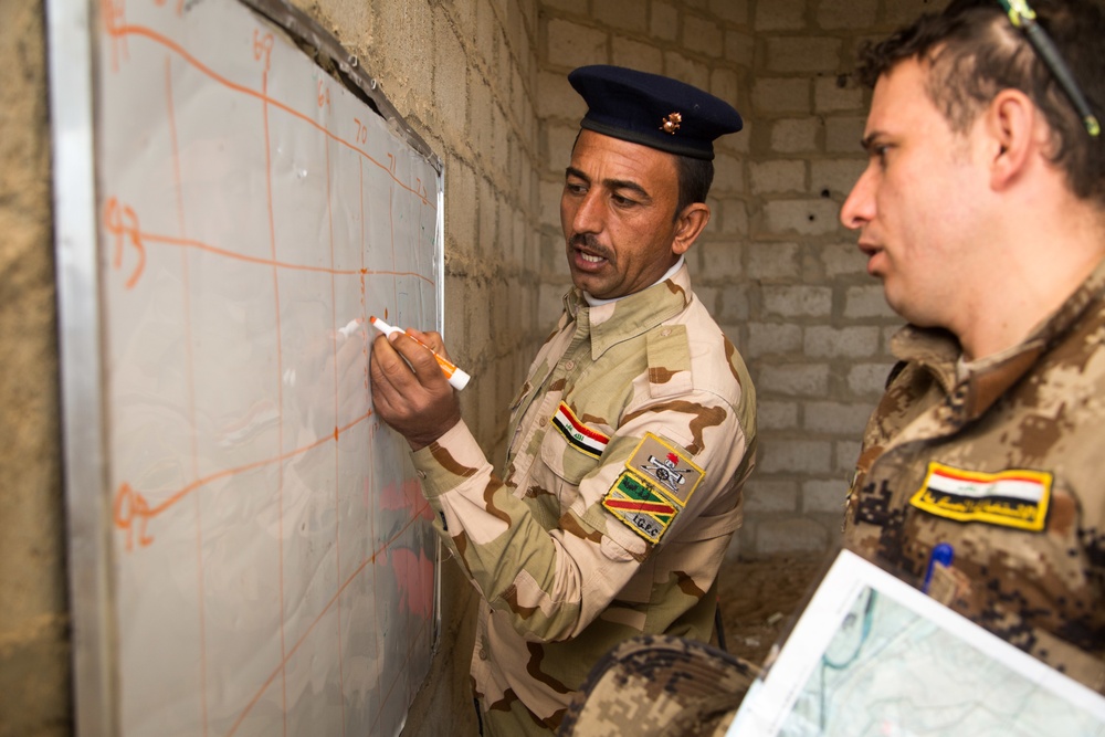 ISF practice map reading during call for fire training