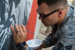 On-duty firefighter, off-duty artist: Deployed Airman improves work environment