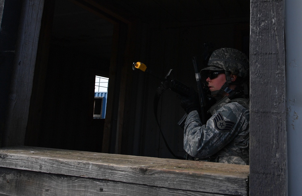 SF Airmen lay the ground fire in urban operations
