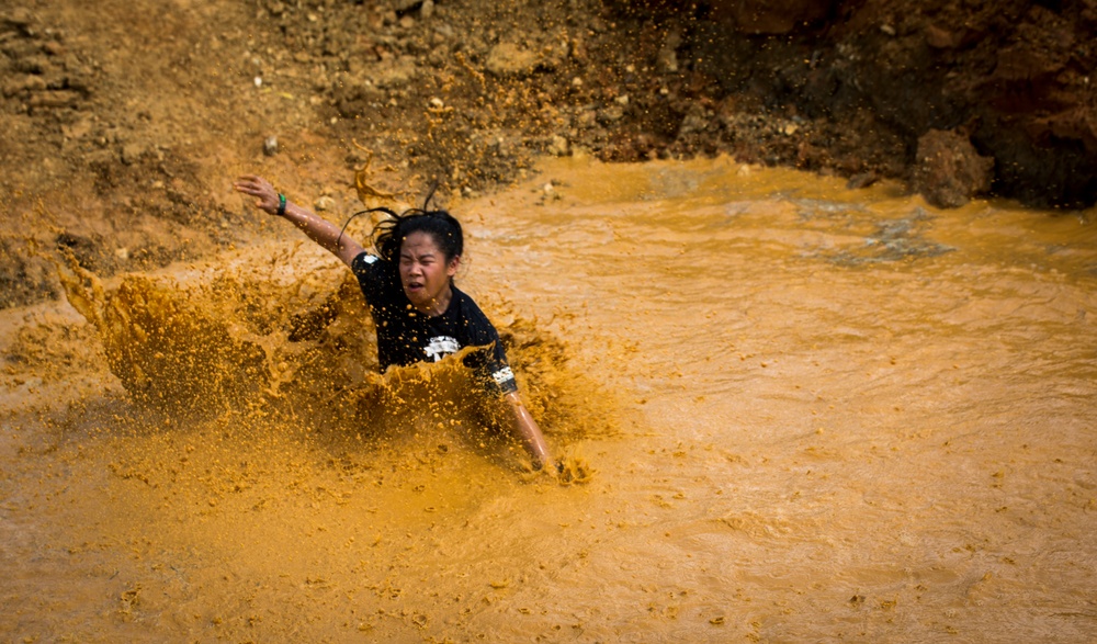 Down and Dirty | Service members and Okinawans gather for Camp Hansen’s annual mud run