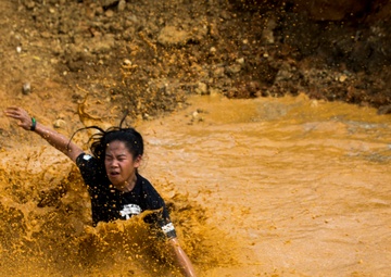 Down and Dirty | Service members and Okinawans gather for Camp Hansen’s annual mud run